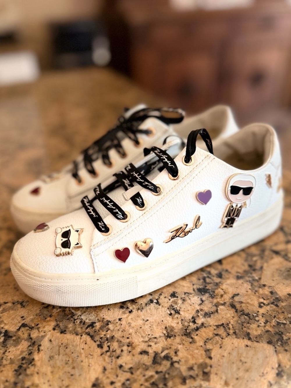 Karl Lagerfeld white leather sneakers in size 6 all around pinned & embroidered